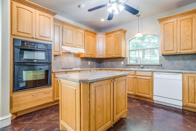 kitchen featuring dishwasher, a center island, sink, black double oven, and pendant lighting