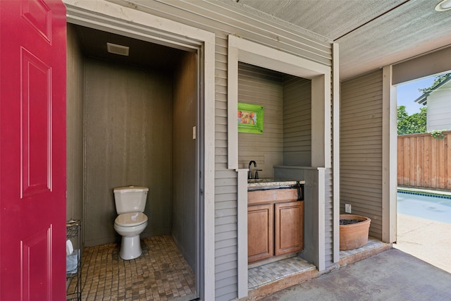 entrance to property with a pool