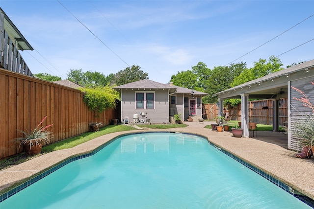 view of swimming pool featuring a patio