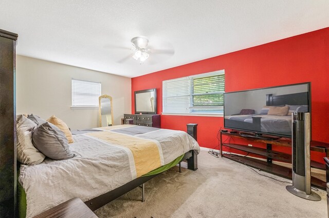 bedroom featuring carpet flooring and ceiling fan