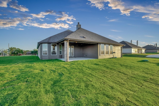 4201 Old Springtown Rd, Weatherford, TX 76085 - rear view of house featuring a patio area, a yard, and a chimney