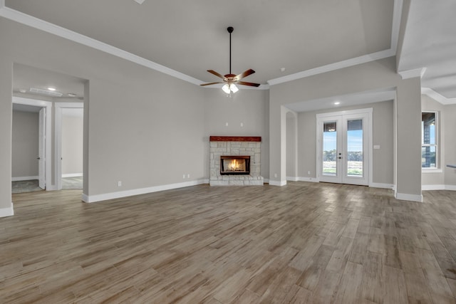 4201 Old Springtown Rd, Weatherford, TX 76085 - unfurnished living room with crown molding, wood finished floors, ceiling fan, baseboards, and a fireplace