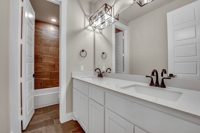 bathroom with vanity and tile patterned flooring