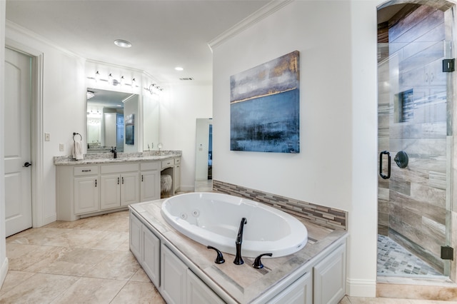 bathroom featuring crown molding, a shower stall, a whirlpool tub, and vanity