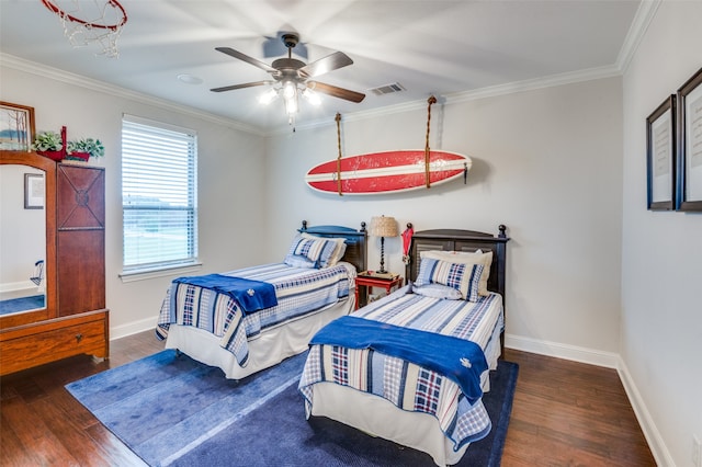 bedroom featuring baseboards, visible vents, ceiling fan, ornamental molding, and wood finished floors