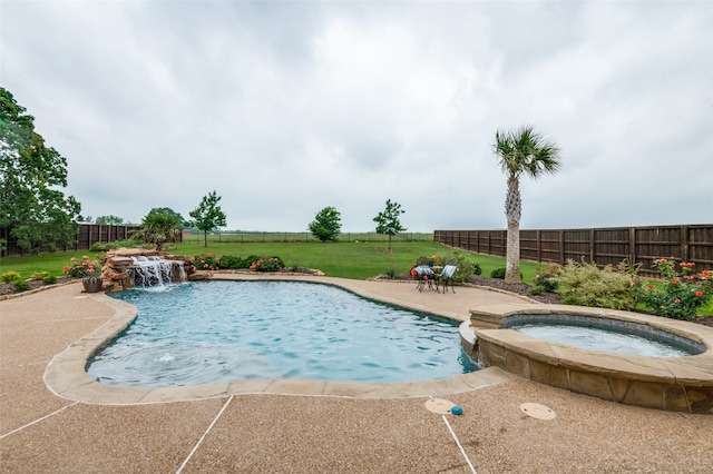 view of pool with a lawn, a patio area, a fenced backyard, and a pool with connected hot tub