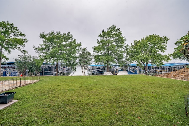 view of yard featuring a boat dock