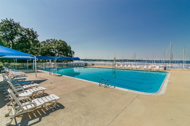 view of swimming pool featuring a patio