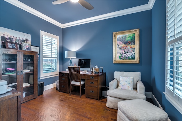 home office with ceiling fan, crown molding, and dark wood-type flooring