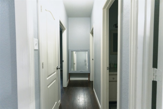 hallway featuring dark wood-type flooring