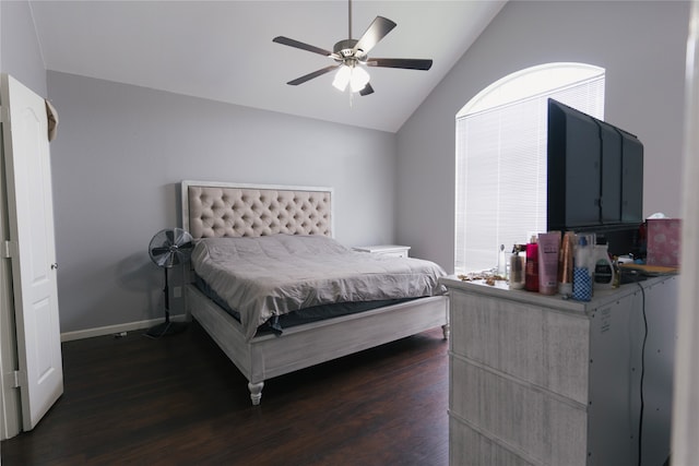 bedroom with dark hardwood / wood-style floors, ceiling fan, and lofted ceiling