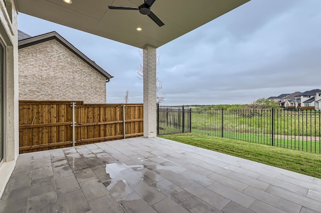 view of patio / terrace featuring ceiling fan