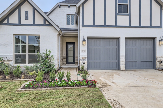 exterior space featuring a front yard and a garage