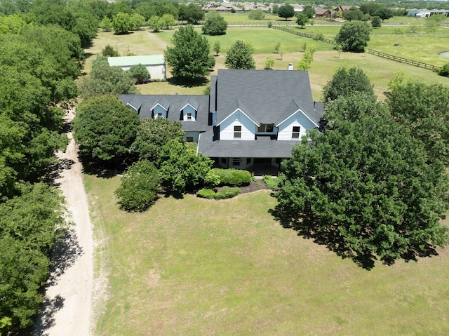 birds eye view of property with a rural view