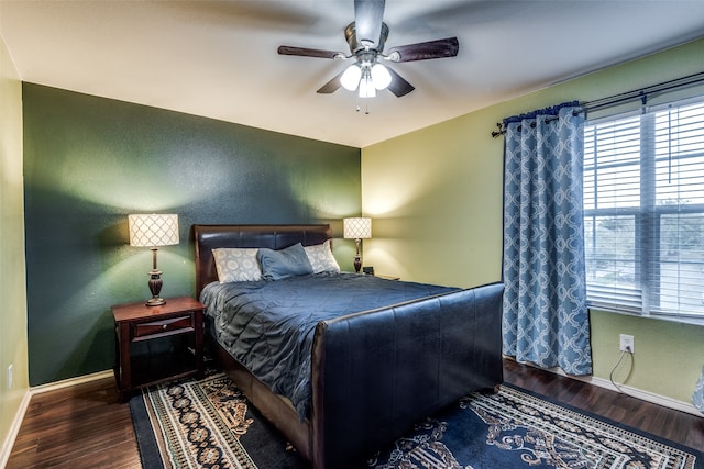 bedroom with hardwood / wood-style flooring and ceiling fan