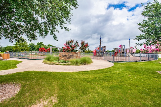 view of playground with a yard