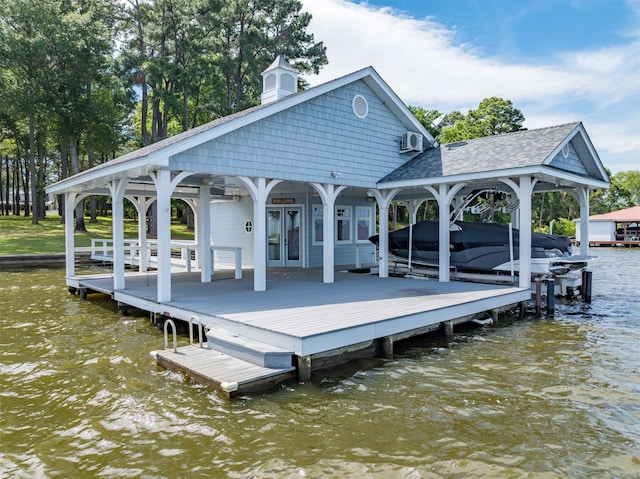 dock area with a water view