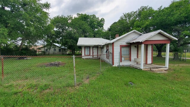 view of front of home with a front yard