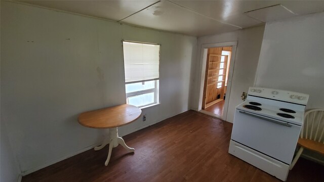 kitchen with hardwood / wood-style flooring and white electric range oven