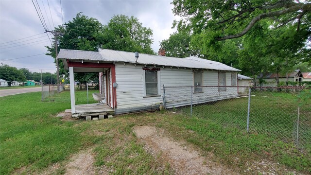 exterior space with a front lawn