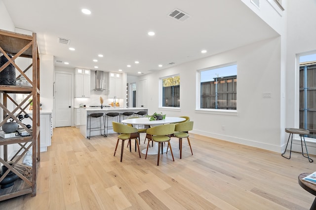 dining room featuring light wood-type flooring