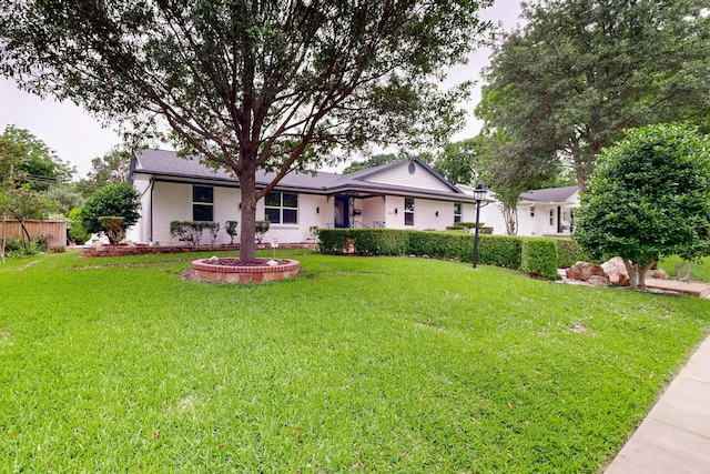 exterior space with a front yard