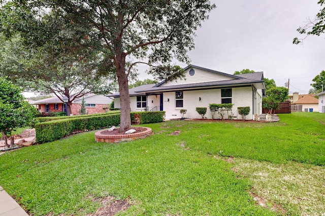 view of front of property with a front lawn