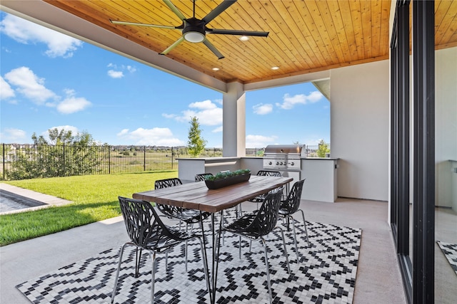 view of patio / terrace featuring area for grilling and ceiling fan