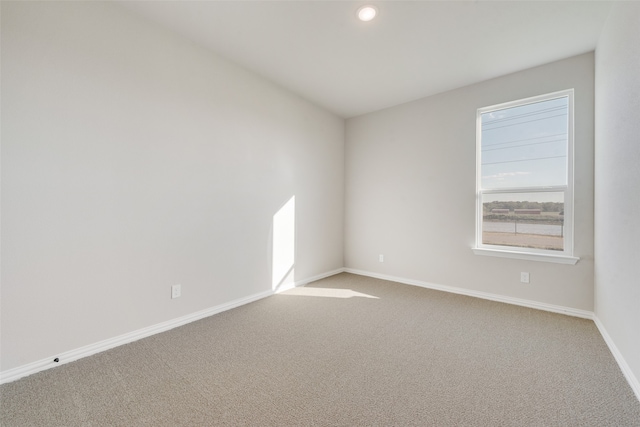 empty room featuring carpet flooring