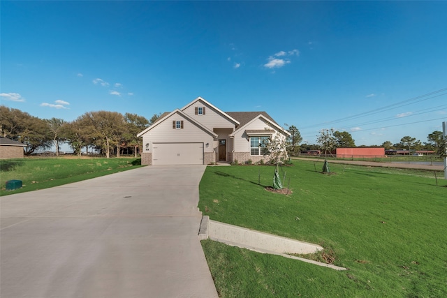 view of front facade with a front lawn and a garage