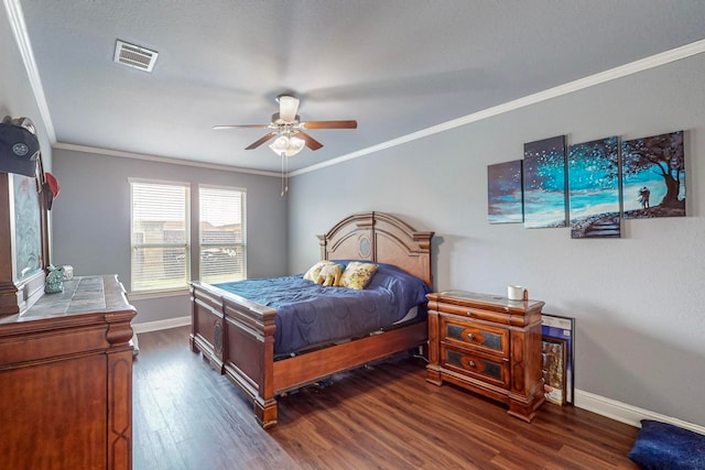 bedroom featuring crown molding, dark hardwood / wood-style flooring, and ceiling fan