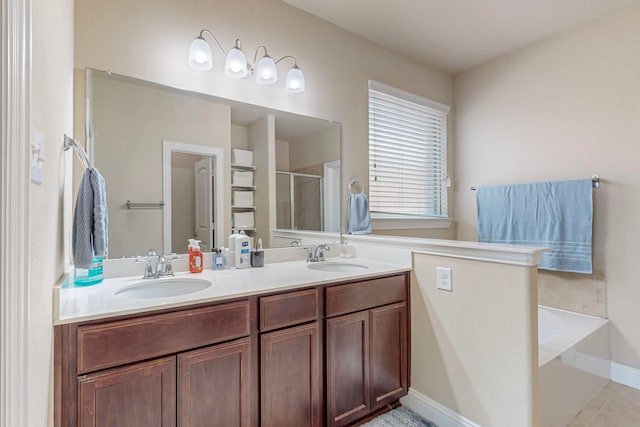 bathroom featuring dual vanity, shower with separate bathtub, and tile patterned floors