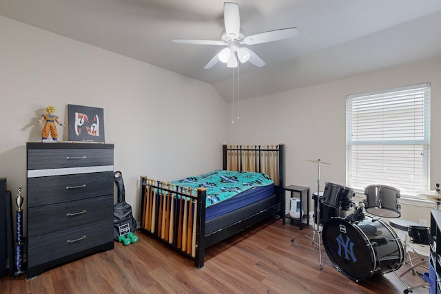 bedroom featuring wood-type flooring and ceiling fan