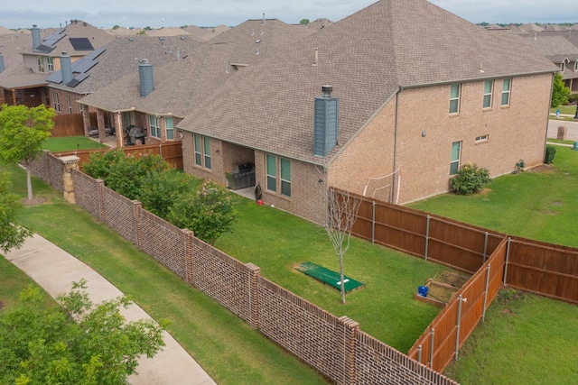 view of community featuring a yard