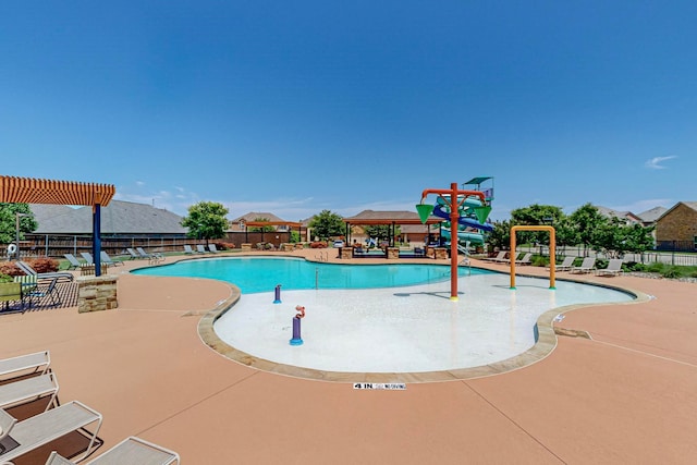 view of pool with a patio, a water slide, and a gazebo