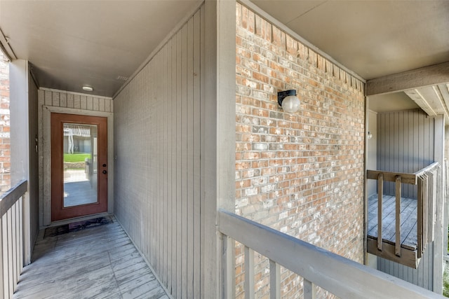 doorway to property featuring a balcony