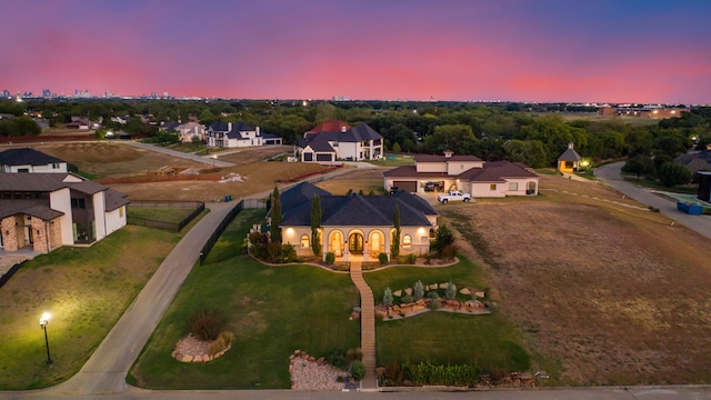 view of aerial view at dusk