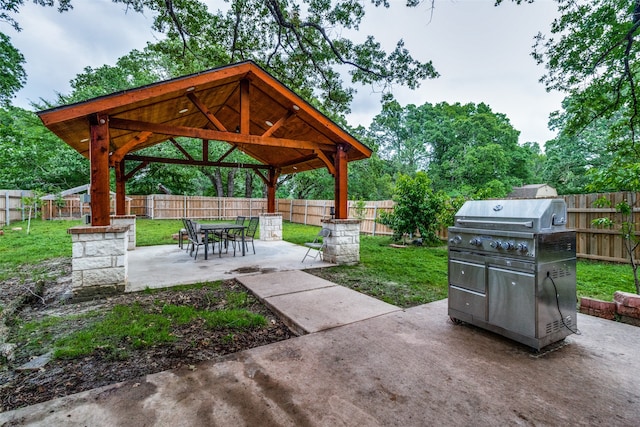 view of patio / terrace with grilling area and a gazebo