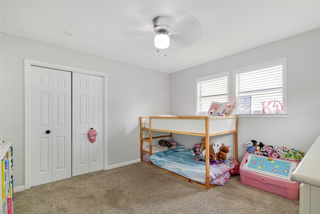 bedroom featuring carpet flooring, a closet, and ceiling fan