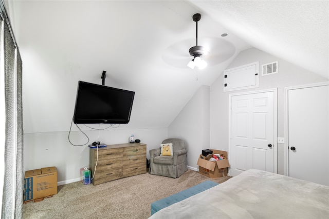 carpeted bedroom with lofted ceiling and ceiling fan