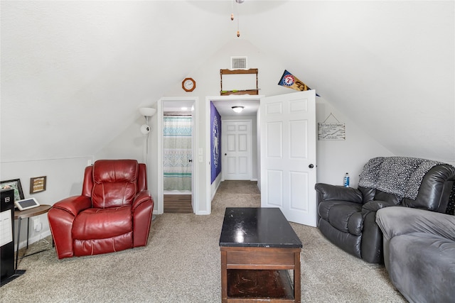 living room with lofted ceiling and carpet flooring