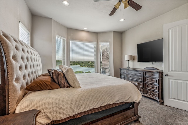 bedroom featuring ceiling fan and carpet floors