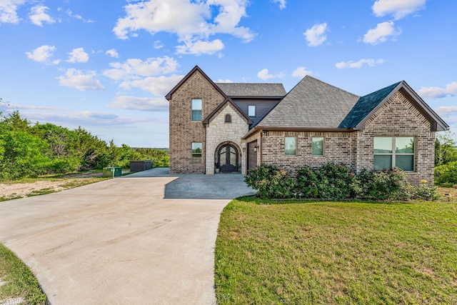 view of front of home with a front lawn