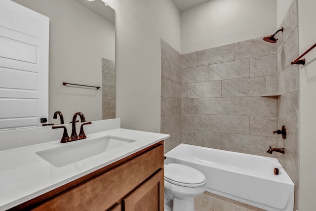 full bathroom with tile patterned flooring, vanity, toilet, and tiled shower / bath combo