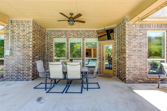 view of patio / terrace featuring ceiling fan