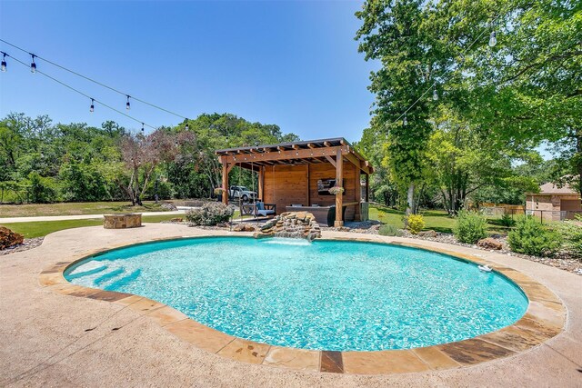 view of pool featuring a patio area