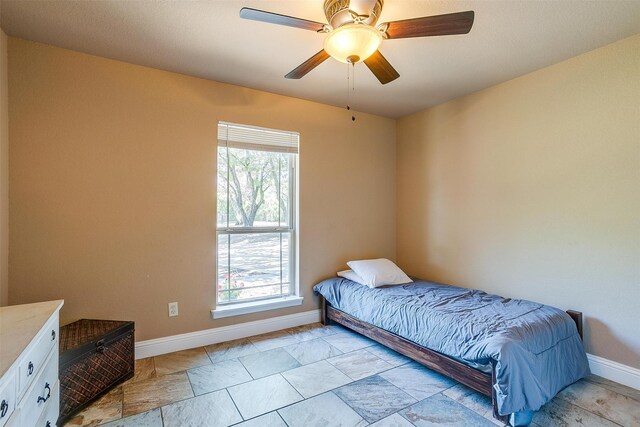 bedroom featuring ceiling fan