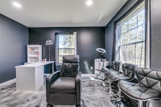 sitting room with baseboards and recessed lighting