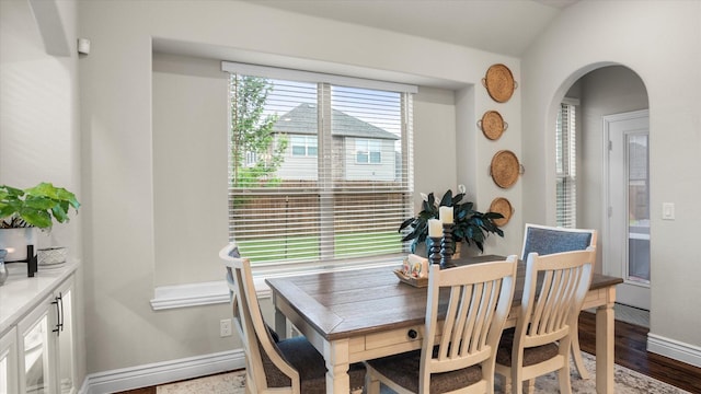 dining area with hardwood / wood-style floors