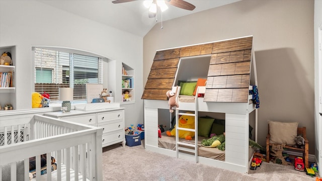 carpeted bedroom featuring ceiling fan and lofted ceiling